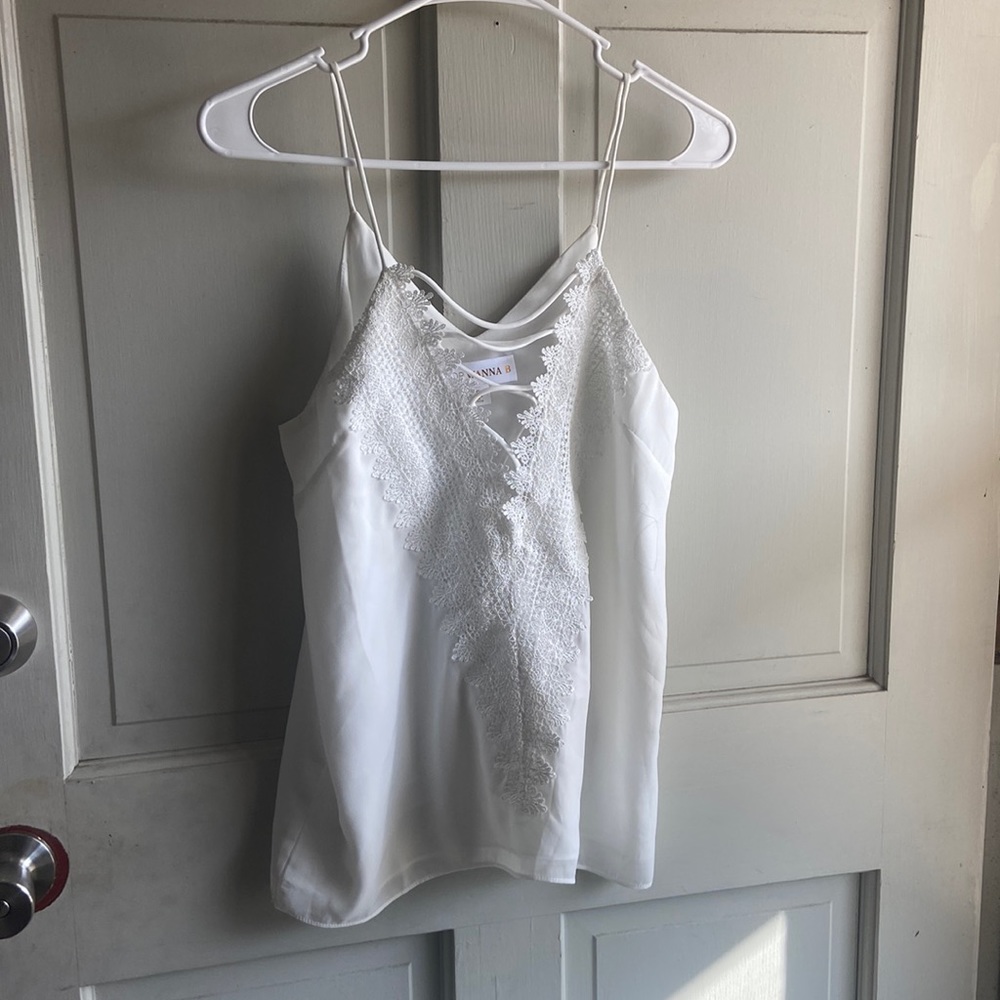Cute whit tank top could be used for date night